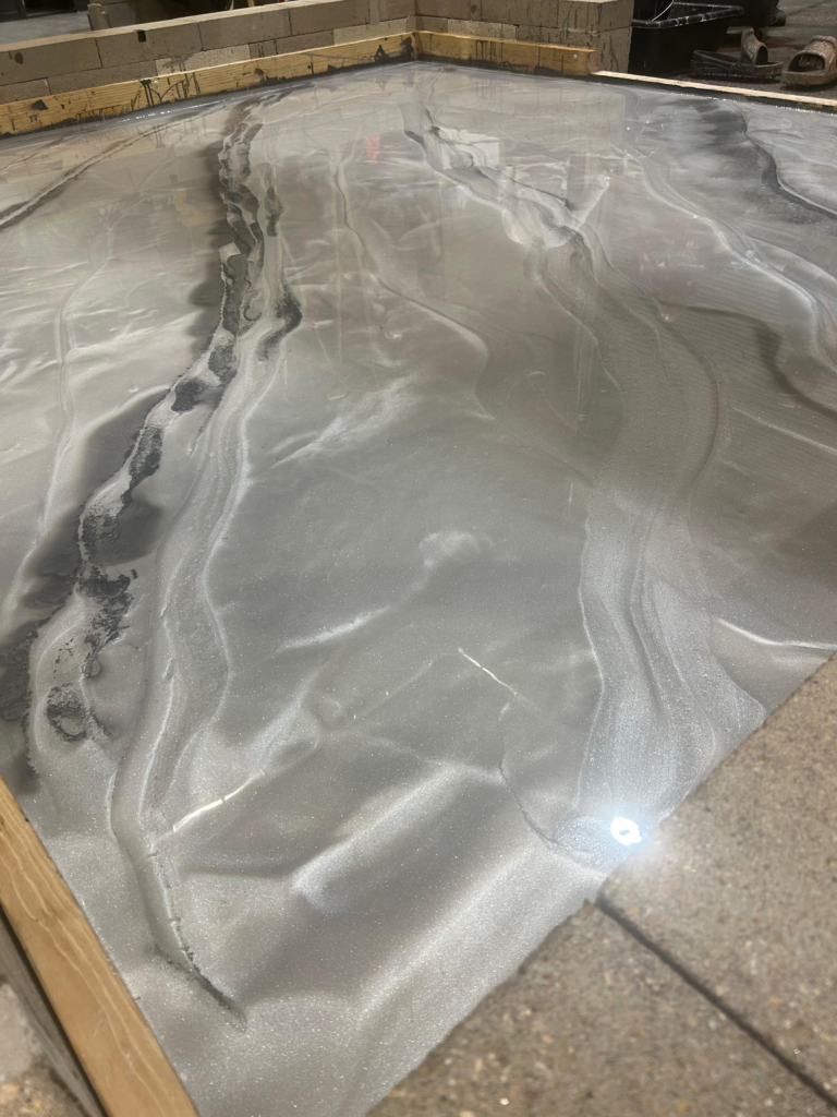 Garage transformed with metallic pearl epoxy flooring