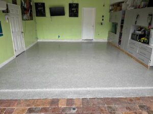 Miami Gardens garage after epoxy floor installation, showcasing durability and modern design.