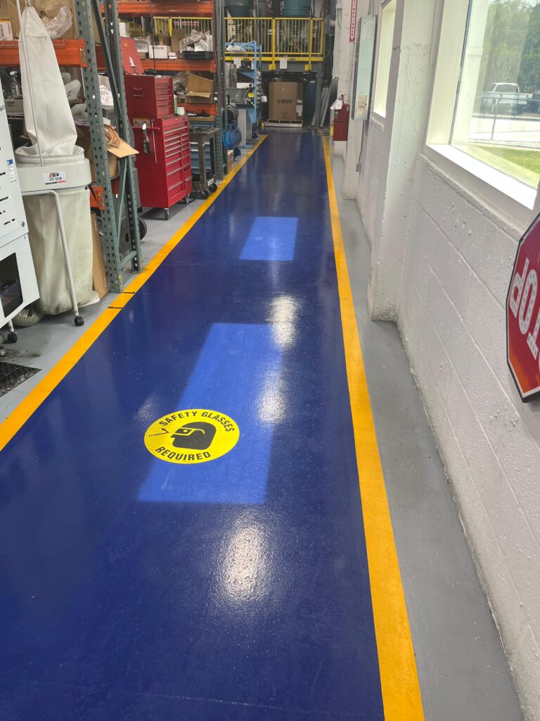 Urethane Cement Flooring for Manufacturing Facility in Pompano Beach, FL | GonzaBuilt Completed urethane cement floor coating in active manufacturing facility after professional installation by GonzaBuilt in Pompano Beach, Florida